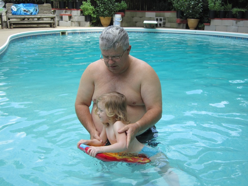 Grandpa and Amelia in the pool1.JPG